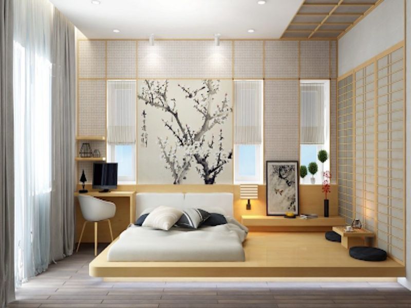Phòng ngủ ấn tượng với giường thấp và những bức tranh hoa anh đào